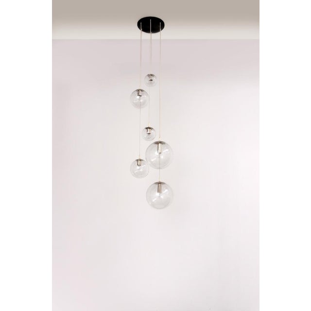 Discover the charm of retro lighting with this authentic Vintage Raak Hanging Lamp, straight from the creative core of...