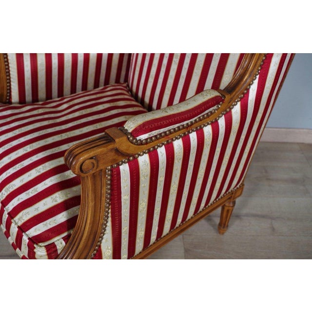 Early 20th Century French Louis XVI Style Walnut Bergères à Oreilles with Fluted Legs - A Pair For Sale - Image 4 of 12