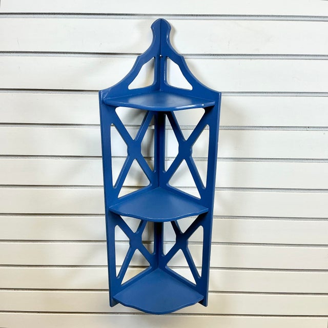 This is a lovely wall-mounted 3-Tier Corner Shelf. It's an Americana Folk Art handmade wood cutout item featuring X-side...