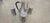 Offered is a striking vintage silver-plated set featuring a large handled pitcher and two matching lidded tankards/steins....
