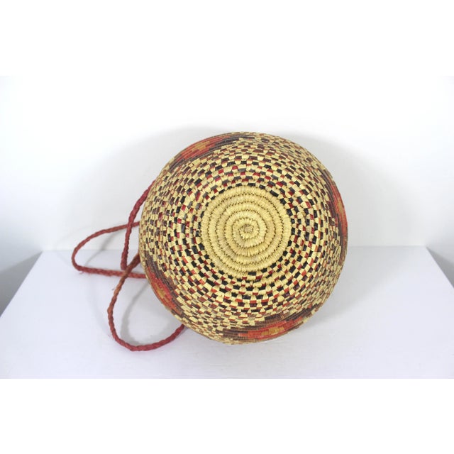 Vintage African Coiled Straw Lidded Two Tone Orange Hand Woven Covered Basket With Straps For Sale - Image 10 of 10