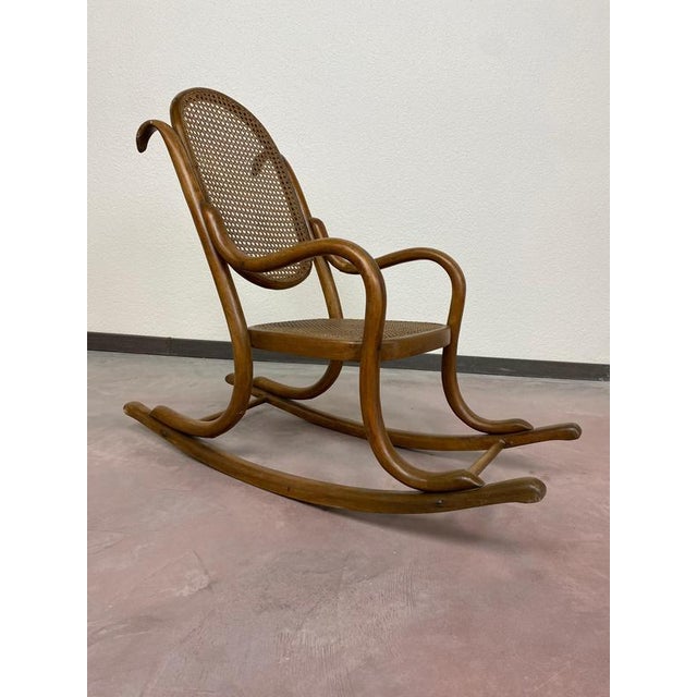 Rocking chair for children no.2 in original condition. This piece is attributed to the mentioned designer/maker. It has no...