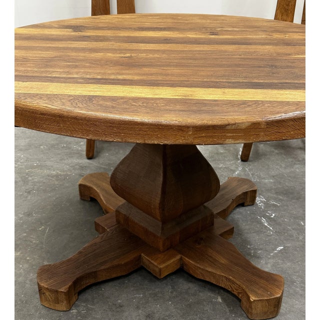 Dining table: 128cm diameter x 75cm high, Dining chairs: 42,5cm W, 44cmD, 45,5cm H seat , 110cm H total This majestic...