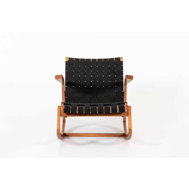 The rare and early mid century wooden rocking chair designed by Ralph Rapson for Knoll is circa 1940. It features original...