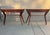 Stunning pair of mid-century modern console tables crafted from solid walnut wood. Each table has three integrated drawers...
