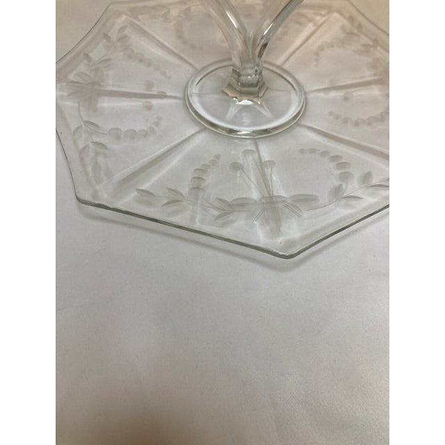 Elevate your dining experience with this vintage etched glass cake stand. Adorned with intricate floral and leaf etchings,...