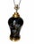 An elegant vintage table lamp featuring a glossy black vase-shaped body adorned with delicate gold-outline flowers,...