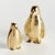 Hand crafted using a centuriesold sand cast method, this set of 2 adorable upright penguin sculptures is a charming little...