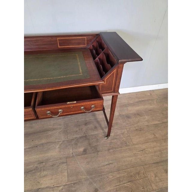 A stunning piece of antique furniture that exudes elegance and sophistication. This piece of furniture will add a touch of...