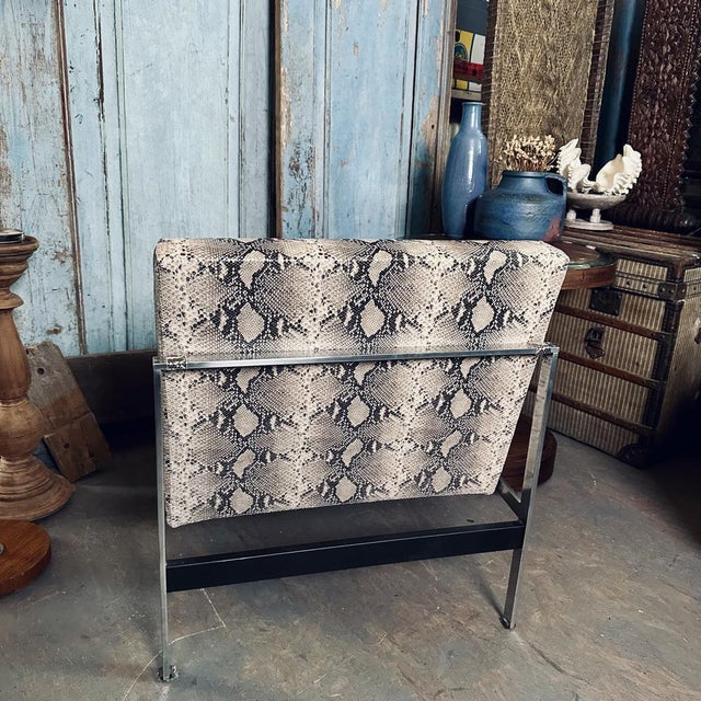 Beautiful vintage chair with a chrome plated frame.
