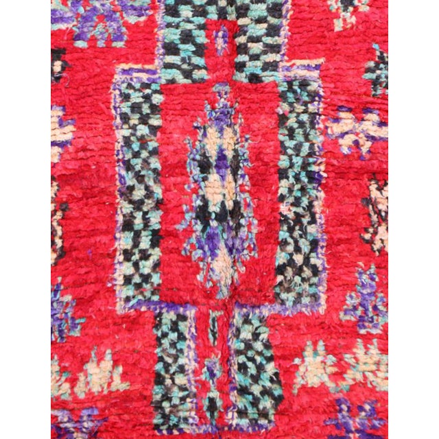 Vintage Moroccan Rug – Handwoven Berber Wool with Vibrant Tribal Motifs This vintage Moroccan rug is a striking example of...
