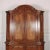 Early 20th C Italian walnut 4 door / 2 drawer cupboard. Fabric interior can be removed if needed. 1920. This piece is...