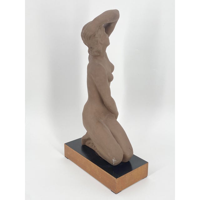 A sculpture * by Prof. Fritz Klimsch (1870-1960) * “Look into the sun” * Ceramic sculpture * red shards, terracotta * matt...