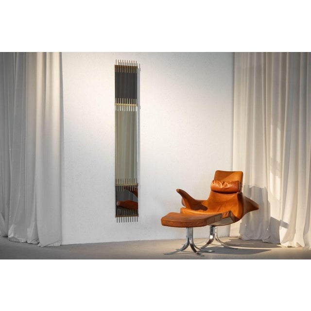 Rare wall mirror designed by Ettore Sottsass Jr. and manufactured by Santambrogio & de Berti, Italy, 1957. This...