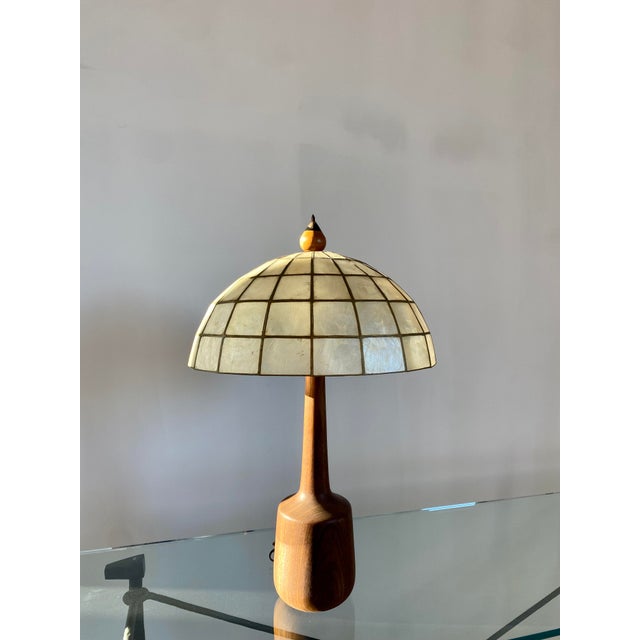 Capiz shell shade + Danish Modern walnut table lamp, circa 1960s. An exquisite and uncommon combination of materials and...