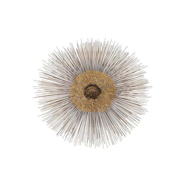 Fabulous mid-century Brutalist mixed metal wall sculpture by William and Bruce Friedle, featuring a dramatic circular...