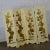 Stunning Hollywood Regency, Art Deco, or Boho Chic four panel folding screen comprised of off-white painted finished wood,...