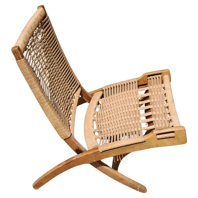 In this listing you will find a pair of Mid Century Modern folding chairs designed by Ebert Wels. The chair was produced...