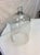 Found in the South of France, this 19th century glass dome or cloche has a solid glass knob handle. Made of blown glass,...