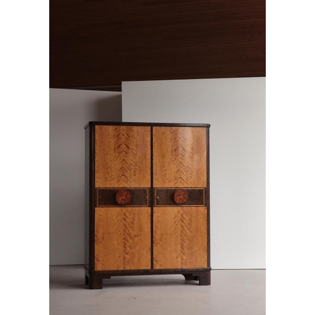 A refined and exceptionally well-preserved example of swedish grace design, this cabinet by otto schulz for boet embodies...