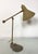 Old shrink or wrinkle lacquered adjustable desk lamp with balance. Nice understated old look. In a good but used...
