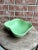 Vintage signed American pottery catchall bowl. Speckled green glaze over ceramic.