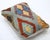 A one-of-a-kind handwoven Afghan wool kilim lumbar pillow featuring diamond medallions on a sage ground. Cut and sewn by...
