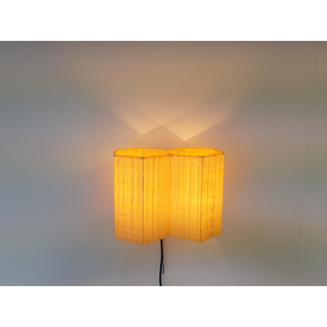 Molecular modern lighting object. The lamp is composed of two hexagonal tubes on a white lacquered frame. The honeycombs...
