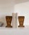 Sculptural pair of vintage bookends featuring stylised Viking ship motifs in relief. Each bookend has a strong geometric...