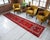 Woven in the 1970s in Southeastern Anatolia, Turkey, this hand-knotted long runner rug showcases a spectacular, vibrant...