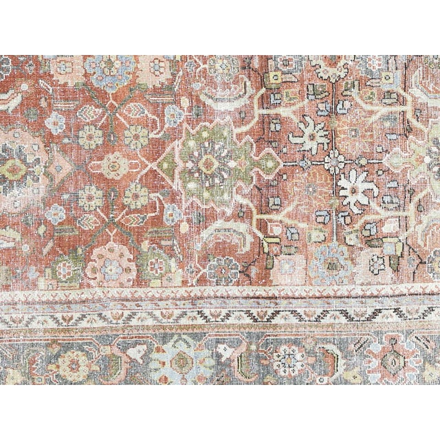 Expertly crafted and one-of-a-kind, the Antique Persian Mahal Rug adds a touch of elegance to any room. Measuring 8' x...