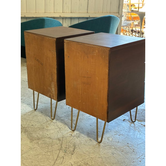 Vintage nightstands, newly refinished walnut, featuring ornate brass handles and brass hairpin legs. Drawers all move...