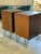 Vintage nightstands, newly refinished walnut, featuring ornate brass handles and brass hairpin legs. Drawers all move...