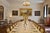 An exceptional and highly impressive set of 16 historic chairs originating from a château interior. Crafted from solid...