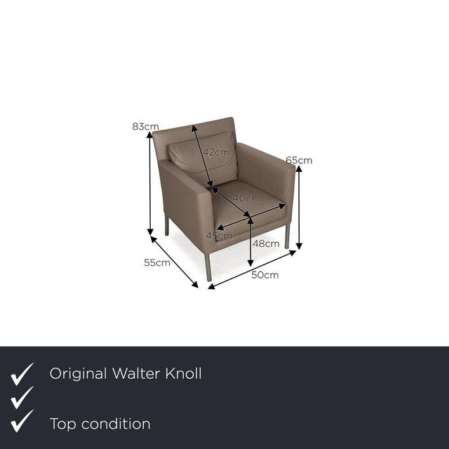 The Jason armchair by Walter Knoll is covered in brown genuine leather and stands on narrow metal feet. The simple design...