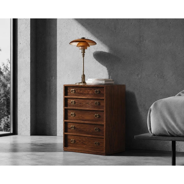 Compact chest of drawers designed by henning korch and produced by silkeborg møbelfabrik in denmark. the cabinet is...