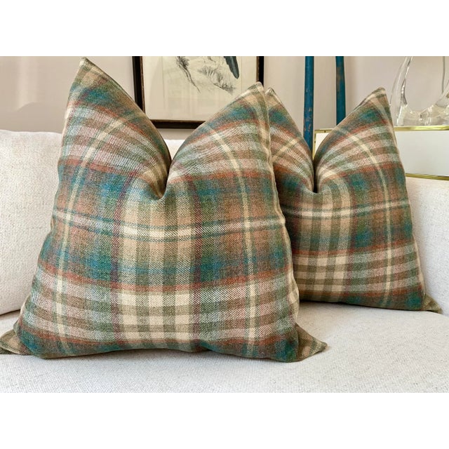 British wool plaid from Lee Jofa. “NEVIS” in Teal and Russet features rich shades of golden tan, green , aqua and a touch...