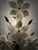 This beautiful set of two wall lights captivates with the charm of its decade. The beautiful glass blossoms were shaped by...
