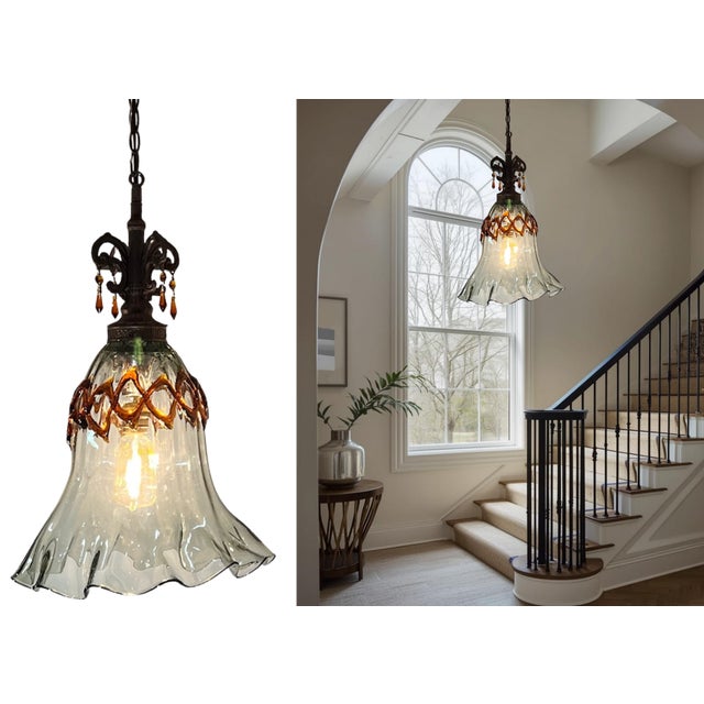 This Art Glass Fazzolletto Transparent Amber Lattice Pendant Light offers a striking yet refined design, seamlessly...