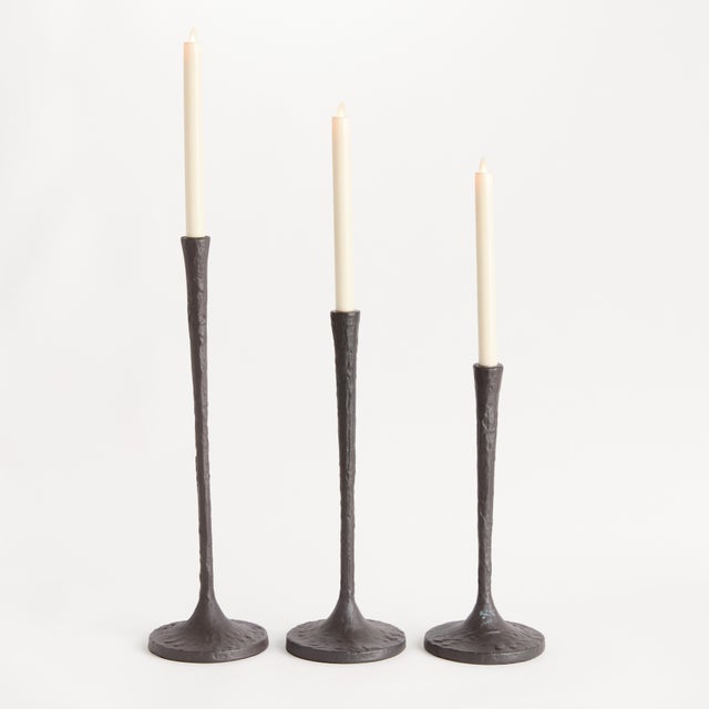 These Giacomettiinspired taper holders are works of art. With a dramatic taper at the bottom and rich bronze finish, they...