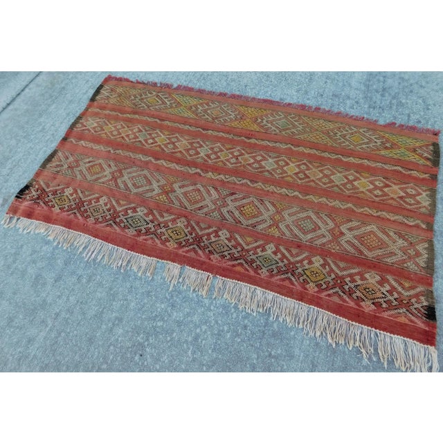 Handmade flat woven kilim in soft colors. Cotton texture. Geometric pattern. 3'x 5'10"