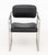 Bauhaus Black Leather Upholstered Chrome Arm Chair. 30.5" H x 22" W x 21" D; seat: 17.5" H; arms: 24.25" H. Provenance:...