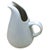 Vintage Mid-Century Modern style pitcher in a streamlined fluid design by Russell Wright. Marked "Russell Wright..." on...