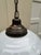 Old Lights On is pleased to offer this vintage dark brass hanging fixture with vintage white school house globe. It is...