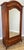 This elegant Antique French wardrobe features a beautifully shaped crown, a full-length polished mirror, and a rich...