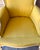 Vintage French Louis XV style bergere armchair. Chartreuse yellow with white wood. carved detail on the arms, legs, and...