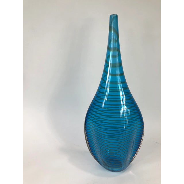 A modern glass blue color vase - Signed John Geci. Please see our additional listings for the gold and/or red versions.