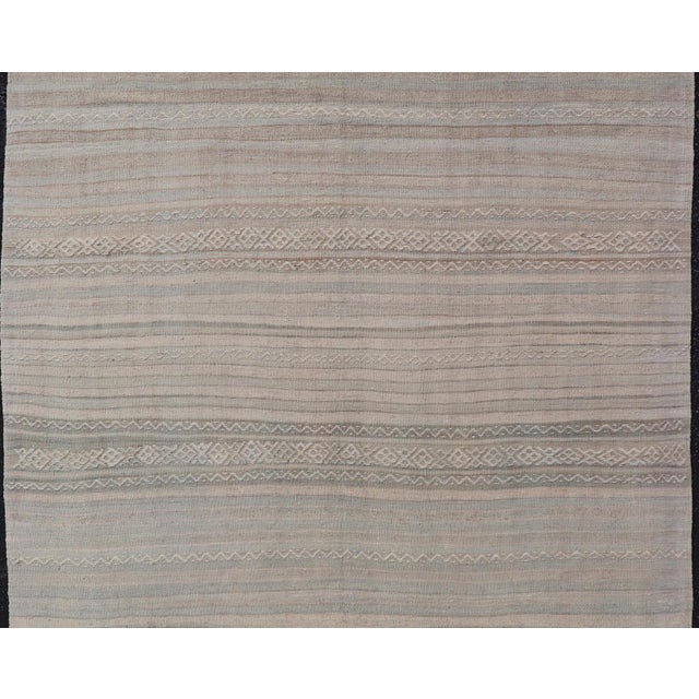 Measures: 4'3" x 6'3" Textured Horizontal Stripe Design Turkish Vintage Kilim Rug in Soft Pastel Neutrals. Keivan Woven...