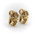 These are 18k gold finely crafted buckle huggie earrings with rubies and diamonds. The earrings have classic 1980’s design...