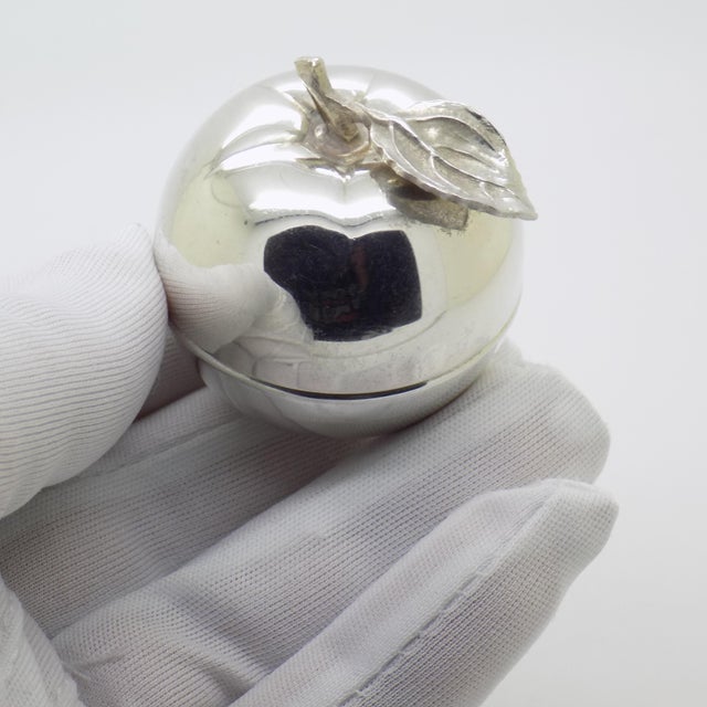 A charming vintage apple-shaped trinket box, handcrafted in Italy during the 1980s/1990s in genuine silver. The rounded...